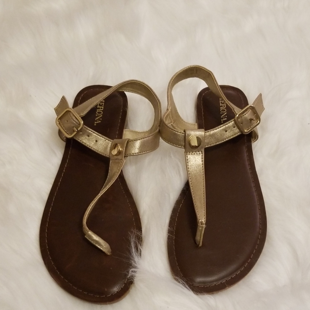 Gold T-strap sandals